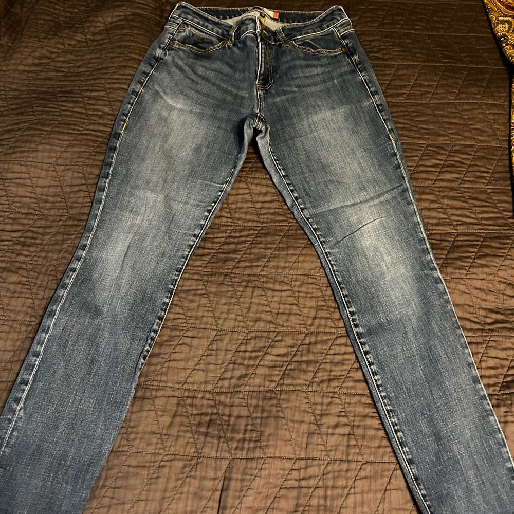 CAbi Women's Skinny Jeans in Faded Blue Wash